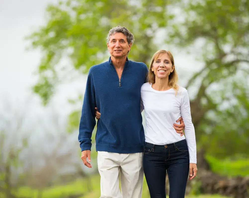 A couple walking together outdoors